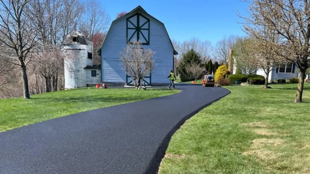 A newly installed driveway after a residential asphalt paving project by J. Hunziker Asphalt Paving