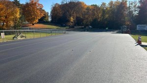 Smooth newly paved road stretching through a rural area in Cairo, NY completed by J. Hunziker Paving
