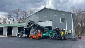 J. Hunziker Paving equipment at a completed commercial asphalt project in Leeds, NY