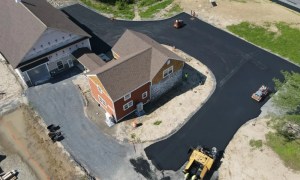 Aerial view of newly paved parking lot and building access in Saratoga Springs NY